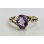 A 9ct Gold and Amethyst Dress Ring, c. 9x7mm stone, size N, c. 2.24g