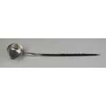 A Georgian silver toddy ladle, unmarked, initialled, the bowl of oval outline, mounted on a spiral