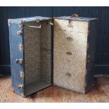 An American Hartmann metal and canvas bound steamer trunk, with two hinged doors, enclosing four