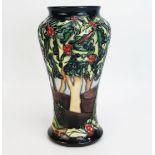 A Moorcroft pottery vase with 'Holly Hatch' decoration designed by Rachel Bishop, released in