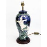 A rare Moorcroft pottery vase table lamp, with female nude decoration, designed by Sarah