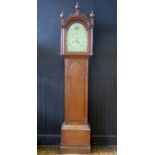 N. Adams, Stowmarket, a George III oak longcase clock, the arched hood with ball and spire finials