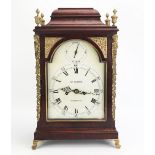William Webster, Whitechapel, a mahogany cased bracket clock. with caddy top with four brass urn and