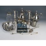 A plated four-piece tea and coffee service of ovoid outline, with foliate capped scroll handles, a