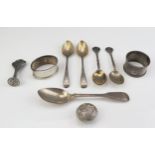 A mixed collection of silverwares, various makers and dates, includes two napkin rings, tea