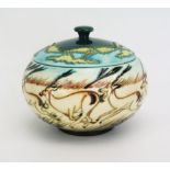 A Moorcroft pottery pot and cover with 'Impala' decoration designed by Kerry Goodwin, released in