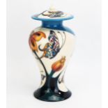 A Moorcroft pottery vase and cover with 'Butterfly Medley' designed by Emma Bossons, released in