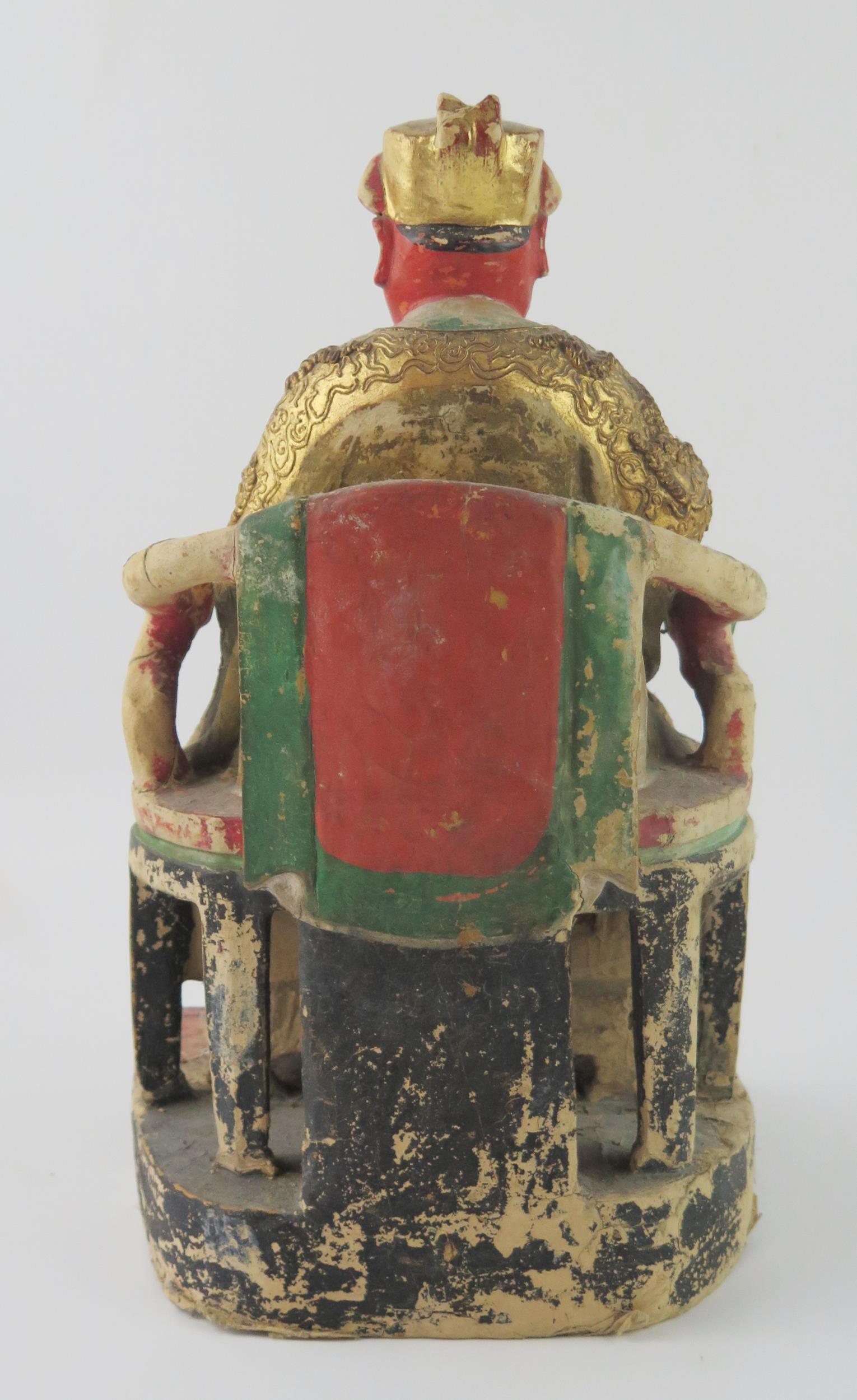 A late 19th century polychrome carved wooden figure of a seated emperor, with gilded decoration, - Image 6 of 8