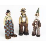 Elizabeth Haslam, three partially glazed models of clowns, in assorted costumes with painted