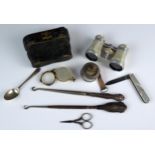 Two silver handled button hooks, tape measure, magnifying glass, folding fruit knife, mother-of-