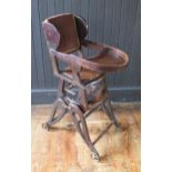 A late Victorian/Edwardian child's metamorphic high chair, with folding tray, on swept legs,
