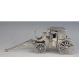 A Brumm white metal model of a horse drawn coach, with spoke wheels and opening doors, 15cm long,