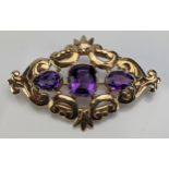 A Victorian Style 9ct Gold and Amethyst Brooch, hallmarked, c. 53.5x34mm, c. 10.13g