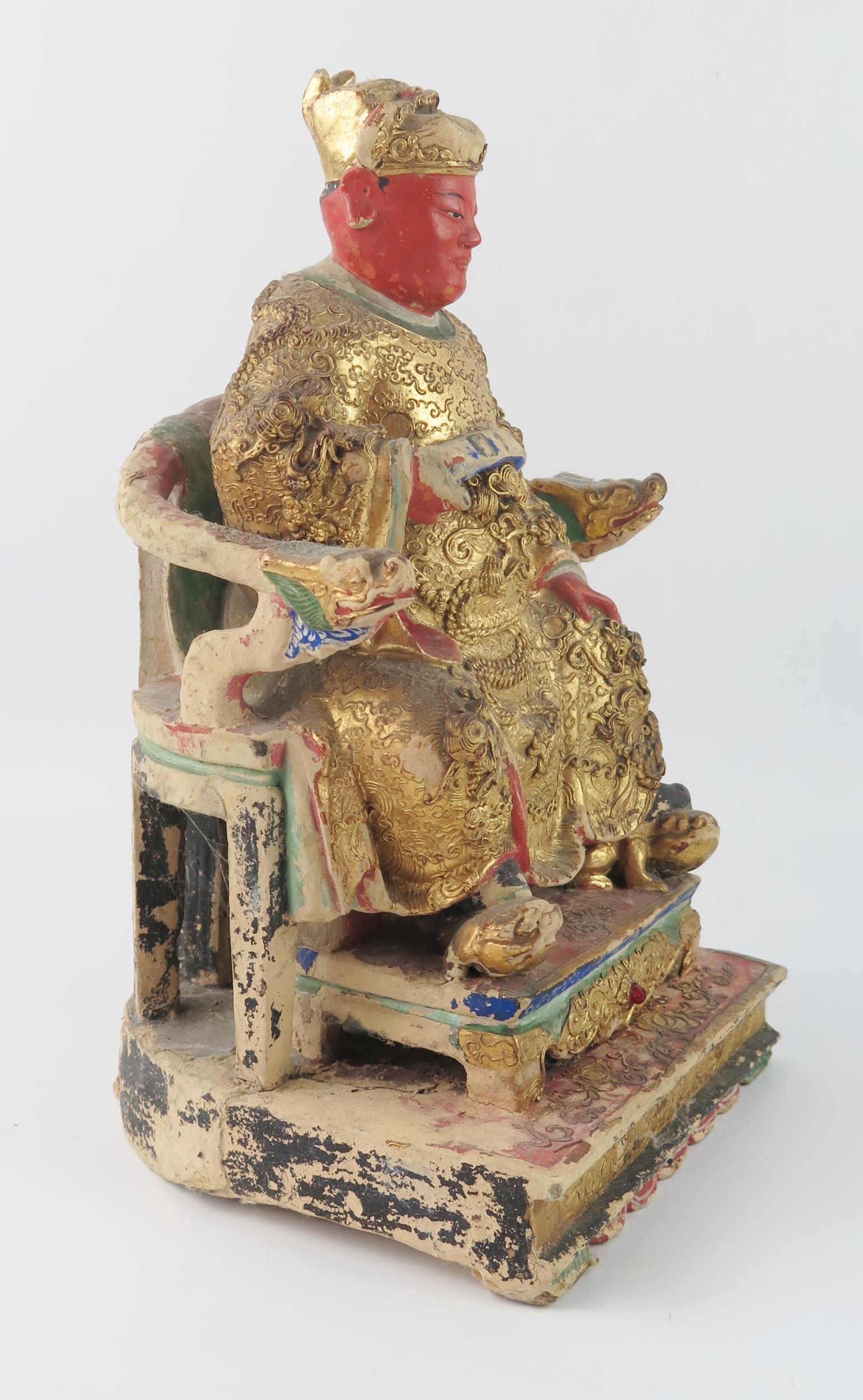 A late 19th century polychrome carved wooden figure of a seated emperor, with gilded decoration, - Image 3 of 8