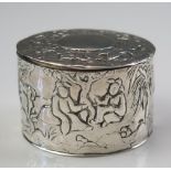 A Victorian silver circular box and cover, maker Colen Cheshire, Birmingham, 1892, decorated with