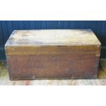 A camphor wood rectangular travelling trunk, with hinged lid and metal loop handles to the sides,