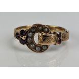 A Victorian untested Pearl and Amethyst Buckle Ring in an unmarked precious yellow metal setting