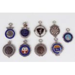 A collection of nine silver and enamel sporting and club medallions, various makers and dates,