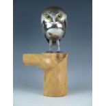 Alan Prince, a modernist metal model of a perched owl, made from spoon bowls and handles, with inset
