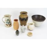 A collection of studio ceramics, including jugs vases, etc.
