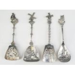 Four assorted Dutch silver plated spoons, with embossed figural decorated bowls, two with windmill