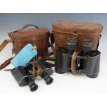 Dolland x 6 binoculars contained in a leather case and a pair of Delactis 8 x 40 binoculars