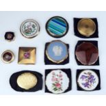 A collection of assorted ladies powder compacts.