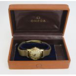 A Gent's Omega Seamaster 18ct Gold Cased Wristwatch on an 18ct gold bracelet, 34mm case marked