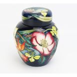 A Moorcroft pottery ginger jar and cover, with 'Golden Jubilee' decoration, designed by Emma