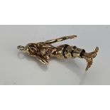 A 9ct Gold Mermaid Charm with articulated tail, hallmarked, 3.98g