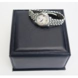 A CHOPARD 'Happy Sport' Ladies Steel and Diamond Wristwatch, 32mm case back no. 27/8238_23 432420