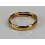 A 22ct Gold Plain Wedding Band, hallmarked, c. 3.5mm wide, size N.25, c. 3.42g. Shank out of true