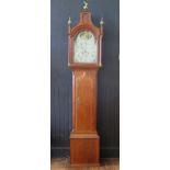 An early 19th century oak longcase clock, the arched hood with ball and spire finials, fluted turned