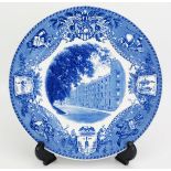 A Wedgwood blue and white decorated plate with transfer print of the Central Cadet Barracks, West