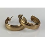 A Pair of 9ct Gold Hoop Earrings, hallmarked, 7mm wide x 25mm diam., c. 2.1g