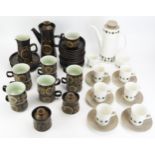 A Denby ware coffee service, includes coffee pot, sugar basins, milk jug, cups, saucers and side