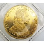 An Austrian 1915 $ Ducat Gold Coin, 13.963g (13.767g pure gold) in a sealed sleeve