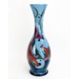 A Moorcroft pottery vase with 'Blue Ebro' tall fish vase by Rachel Bishop, released in 2009, 37cm