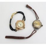 A 9ct Gold Cased Ladies Wristwatch (47mm case) and a silver cased wristwatch. Both need attention