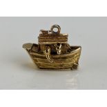 A 9ct Gold Noah's Ark Charm with articulated hull opening to reveal animals, hallmarked, c. 2.75g