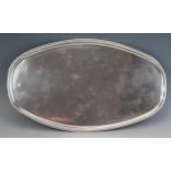 An electro-plated oval tray, with moulded edge, 31cm wide.