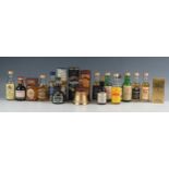 A collection of assorted miniature bottles of Scotch whisky's _ various distillers.