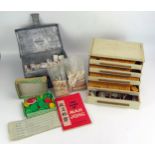 A Mahjong set contained in a fitted case, together with another Mahjong set. (2).