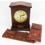 An Edwardian mahogany mantel clock, of arched outline, with 14cm silvered Arabic dial, the