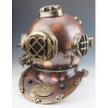 A reproduction copper U.S. Navy Mark V style diving helmet with collar plate, 47cm high.