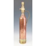 An early 20th century brass and copper fire extinguisher, 45cm high.