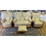 An Ercol three piece settee suite, with two seater settee and two armchairs with loose cushion seats