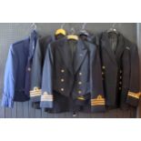 A Royal Naval reserve officer's uniform for the rank of Commander, a mess jacket and waistcoat and