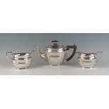A George V silver matched three-piece silver tea service, maker William Aitken, Birmingham, 1910/20,