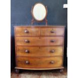 A Victorian Mahogany Bow Fronted Chest of Drawers, 109(w)x108(h)x59(d)cm and a swivel toilet mirror